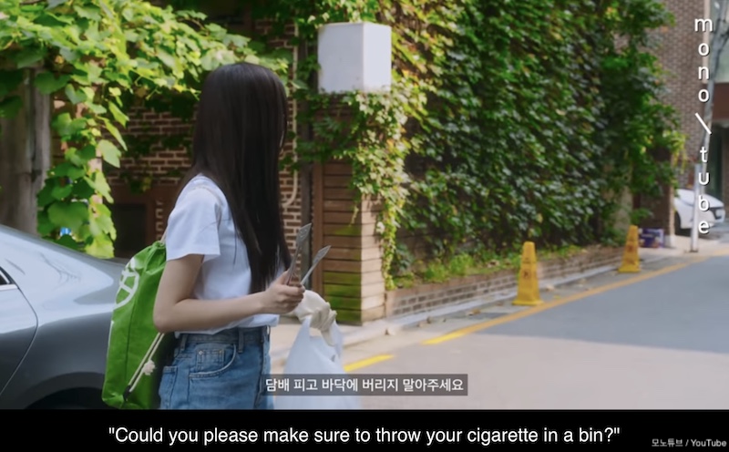 タバコを吸う人にポイ捨てを注意喚起するサナ